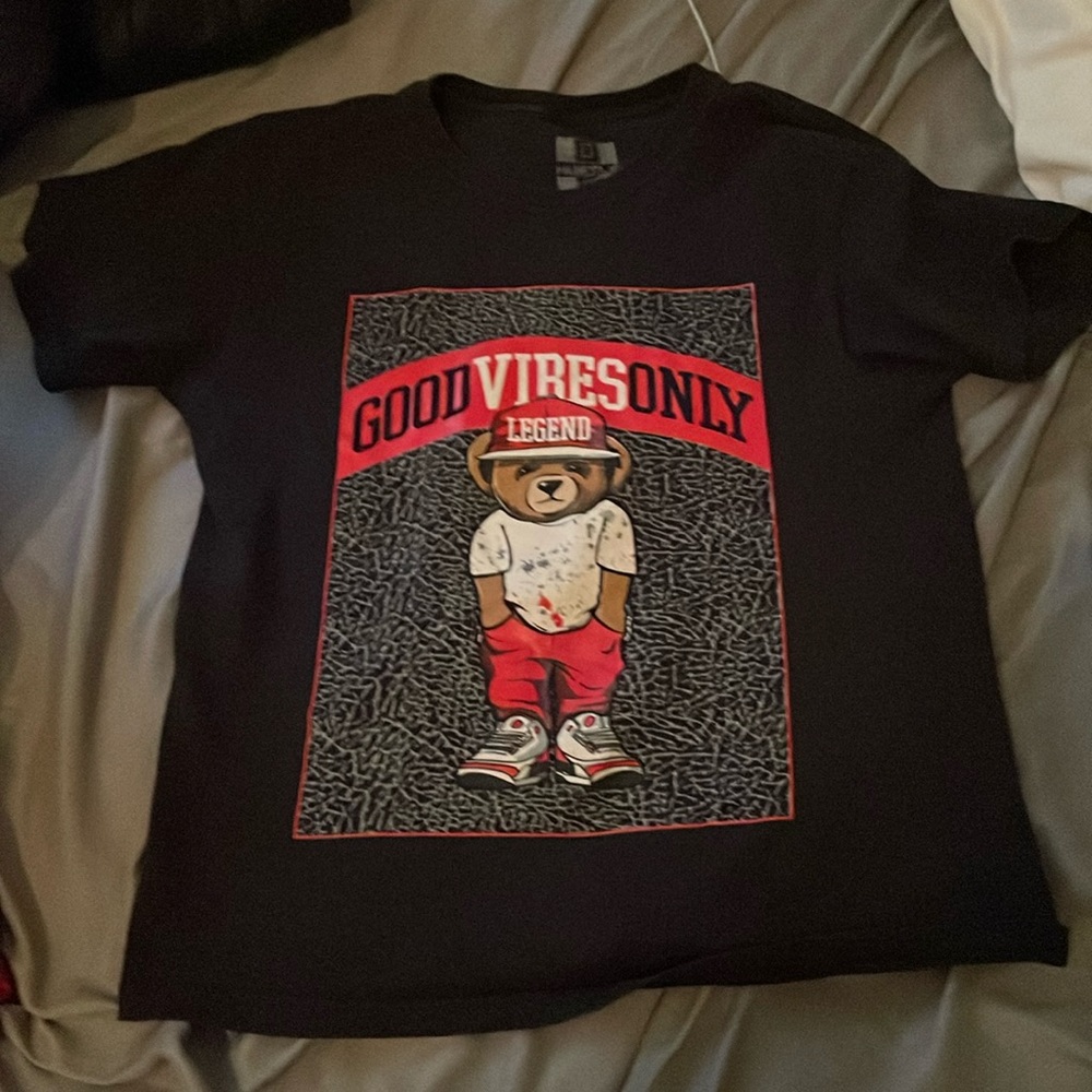 This is an nice shirt good quality it says hustle
